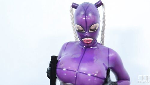 She Looms in Latex